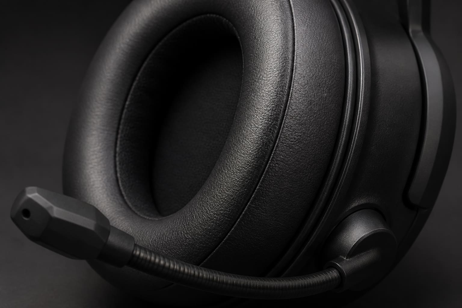 Gaming headset microphone close-up on a boom arm